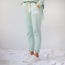 Load image into Gallery viewer, Titoki Trackie side view in Matcha colour